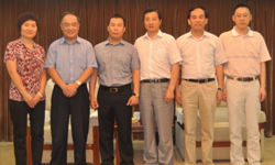 闸北区区长周平等领导会见集团公司总裁郑建龙一行